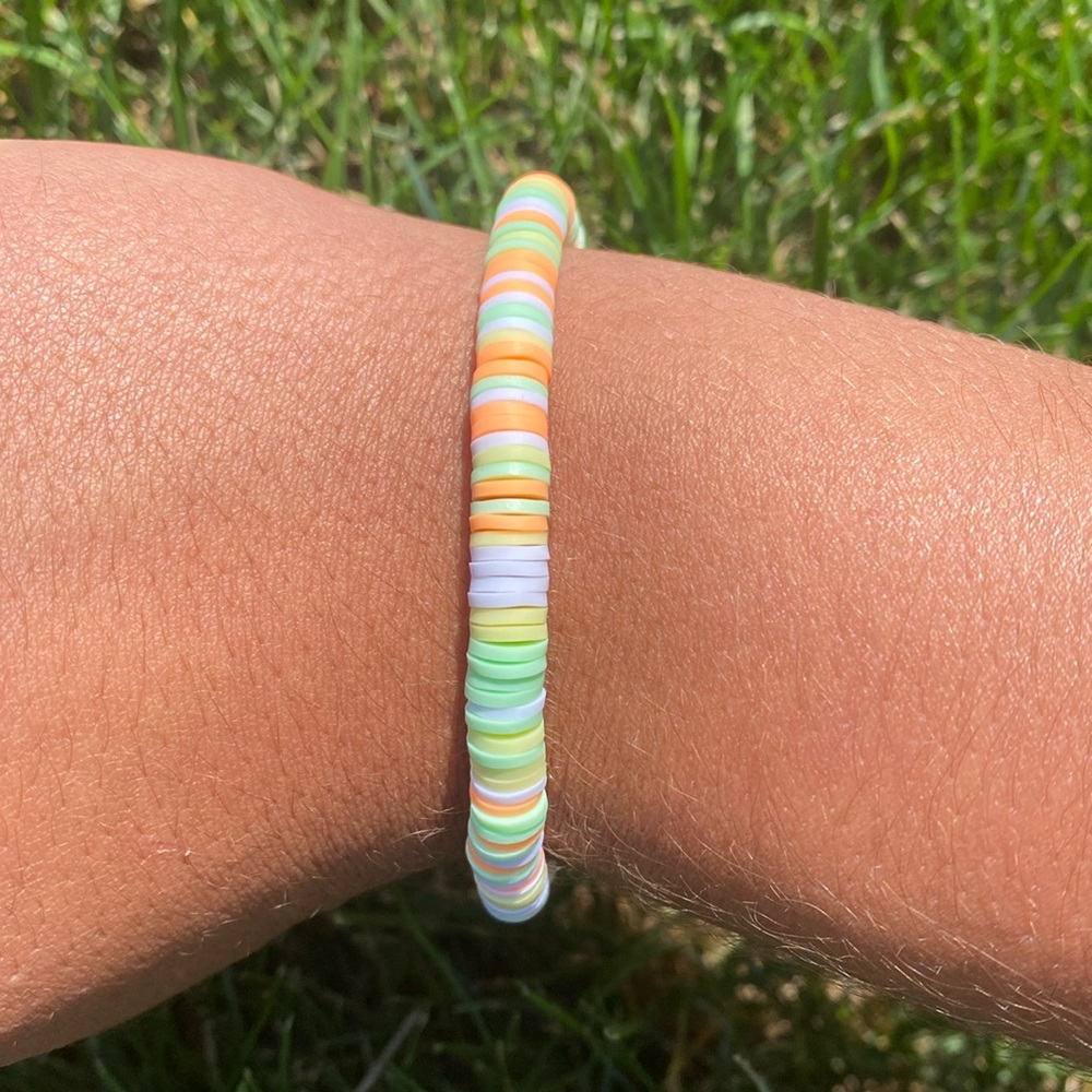 A handmade clay bead bracelet